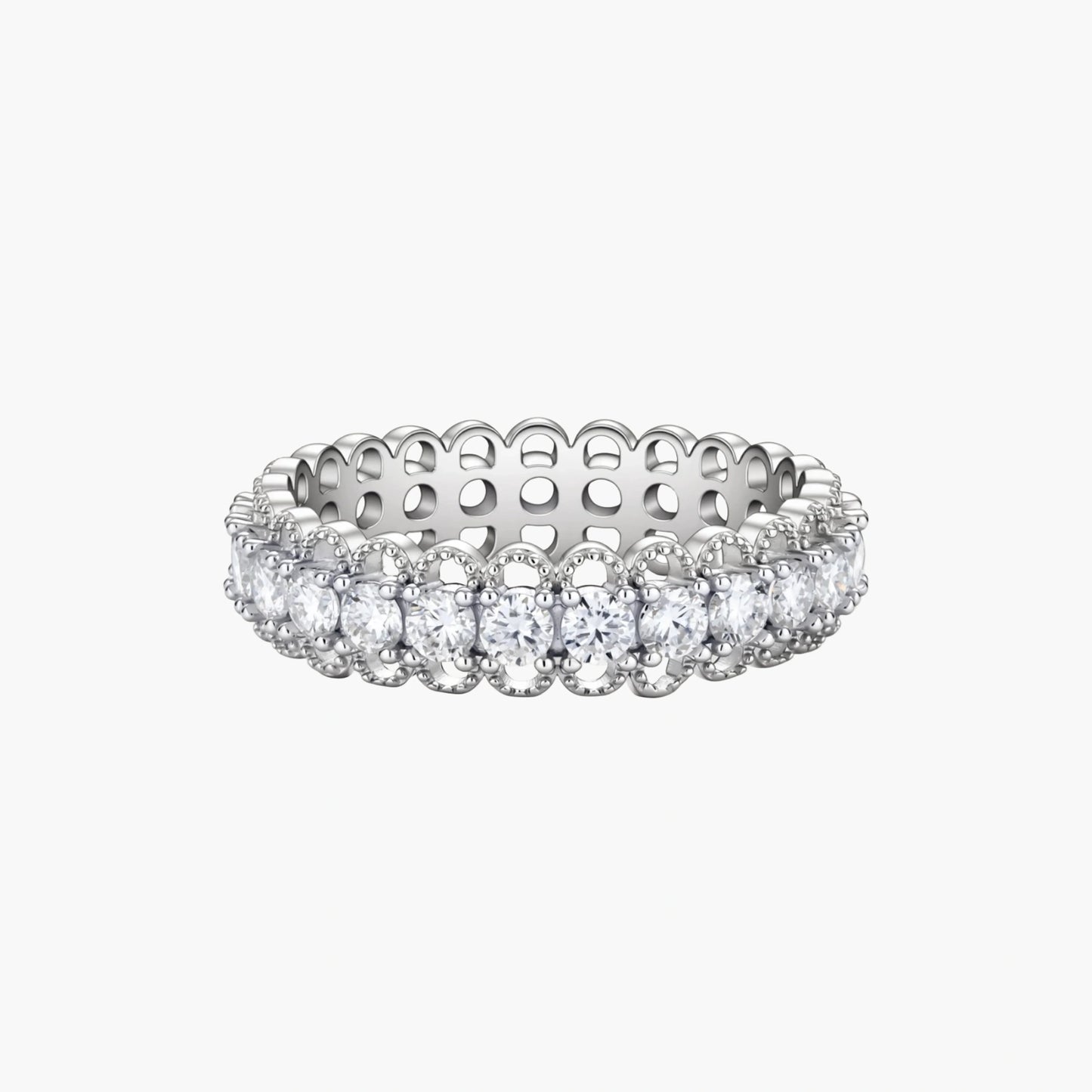 Sterling silver eternity ring with continuous row of brilliant moissanite stones in scalloped crown setting with milgrain detail